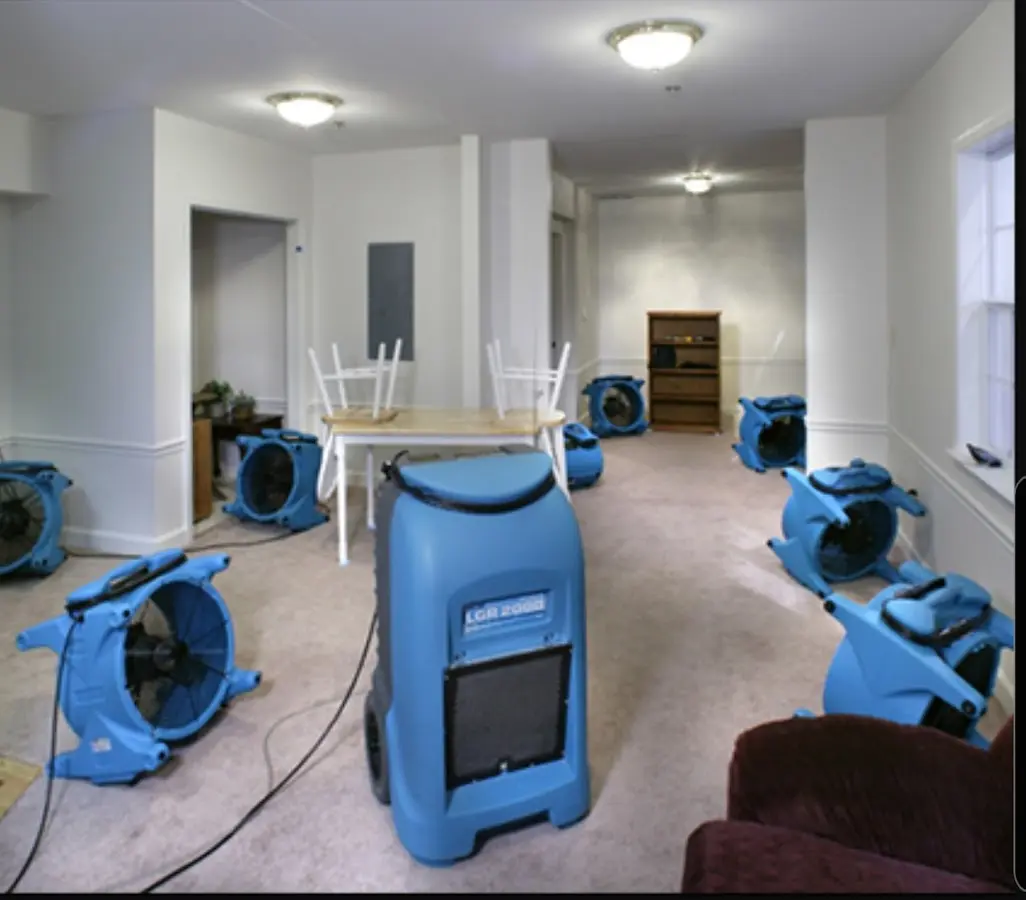 Air movers and dehumidifier setup for Water Damage Restoration in Grandville